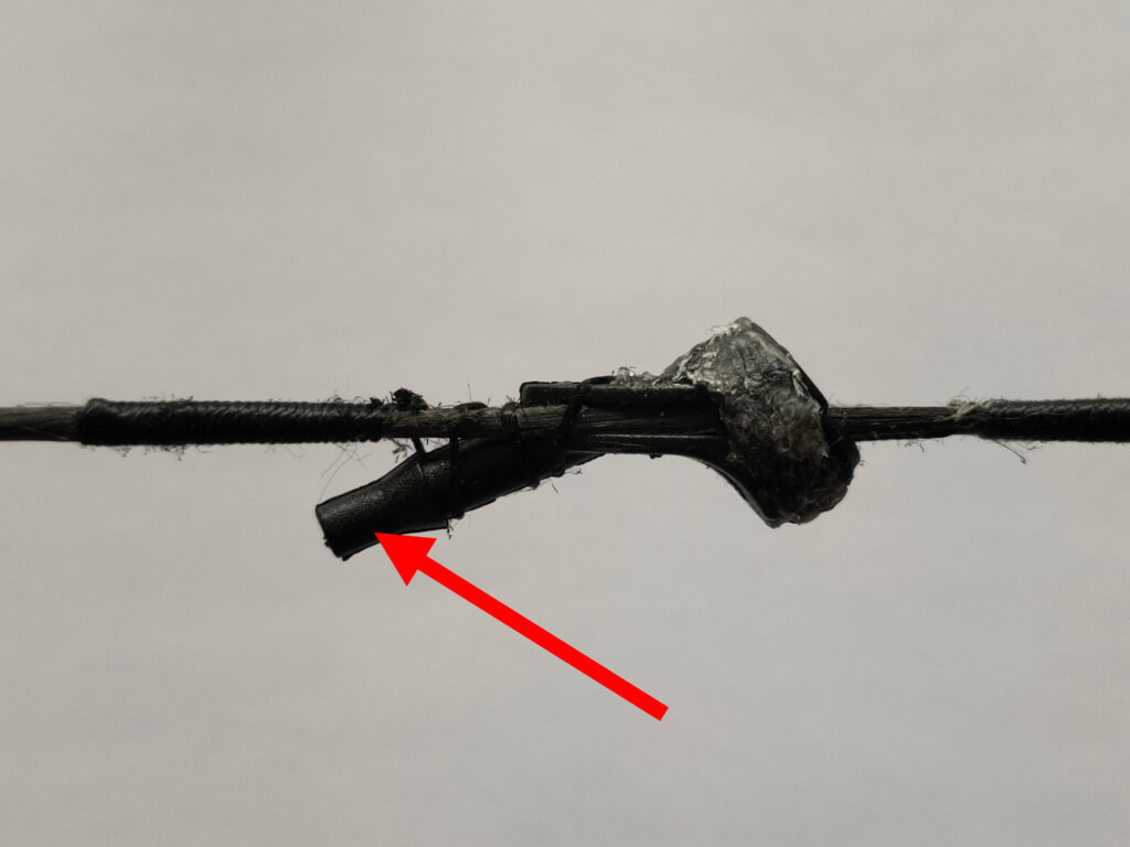 peep sight with arrow on alignment fitting